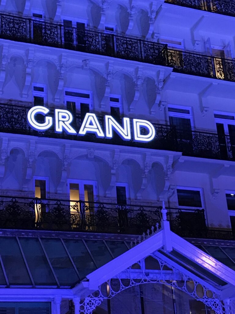 illuminated signage at The Grand Hotel