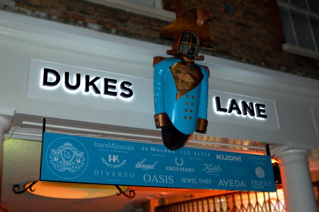 illuminated signage for Dukes Lane shopping area