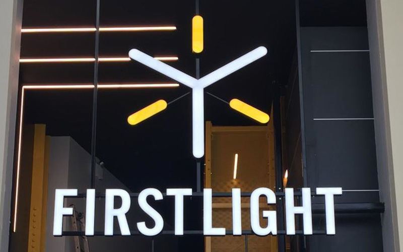 shop signs illuminated for First Light